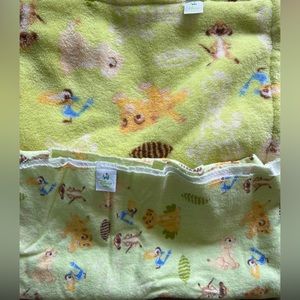Disney baby Lion King nursery items: blankets and crib sheets.